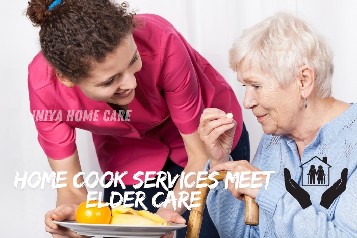 Caregiver assisting an elderly woman with her meal, highlighting the integration of home cook services and elder care provided by Iniya Home Care in Pollachi