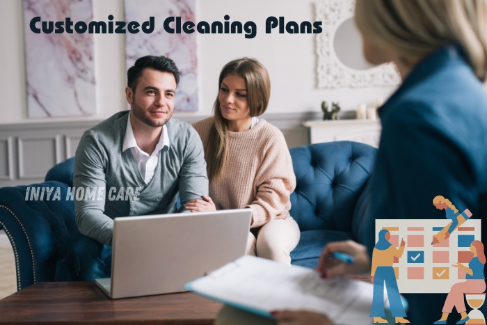 Couple discussing customized cleaning plans with a professional, highlighting the personalized housekeeping services provided by Iniya Home Care in Pollachi. Tailored cleaning solutions to meet your specific home needs.