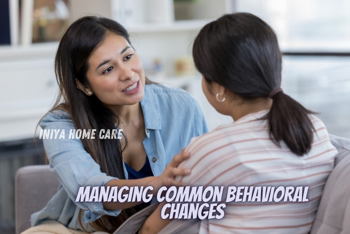 Managing common behavioral changes by Iniya Home Care in Pollachi. A compassionate caregiver offers emotional support to a client, symbolizing understanding and assistance in dealing with behavioral changes. This image highlights the personalized care provided to clients experiencing dementia or other cognitive challenges