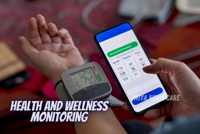 A caregiver checks blood pressure using a digital monitor while displaying results on a smartphone